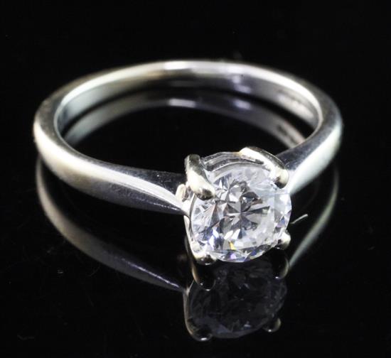 An 18ct white gold and solitaire diamond ring, size J.